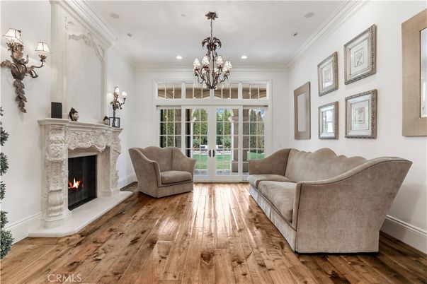 Chandelier, Fireplace, Interior, Living room, Recessed Lighting, Wood Texture Flooring