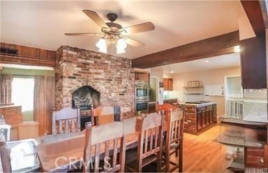 Dining room, Fireplace, Interior, Kitchen, Recessed Lighting, Stone Walls, Wooden Beams, Wood Texture Flooring