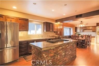 Dining room, Interior, Kitchen, Pendant Lights, Recessed Lighting, Stainless Steel Appliances, Wooden Beams, Wood Texture Flooring