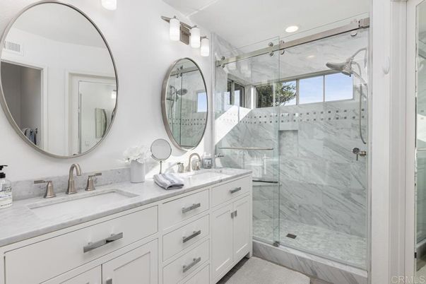 Bathroom, Dual Sink Vanities, Glass Shower, Interior, Marble Walls, Recessed Lighting