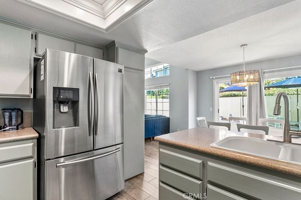 Dining room, Interior, Kitchen, Pendant Lights, Stainless Steel Appliances, Wood Texture Flooring