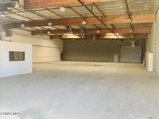 Garage, Interior, Stone Walls, Wooden Beams