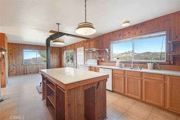 Interior, Kitchen, Pendant Lights, Tile Countertops, Wooden Walls