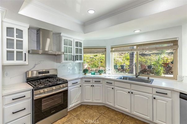 Interior, Kitchen, Marble Walls, Recessed Lighting, Stainless Steel Appliances
