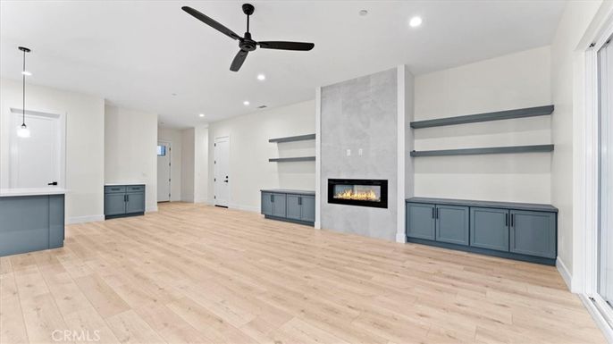 Empty room, Fireplace, Interior, Pendant Lights, Recessed Lighting, Wood Texture Flooring