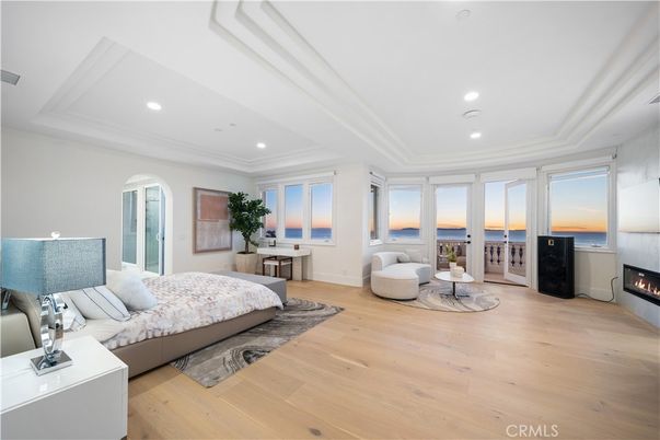 Bedroom, Fireplace, Interior, Living room, Recessed Lighting, Water, Wood Texture Flooring