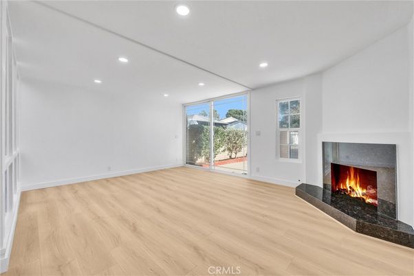 Empty room, Fireplace, Interior, Recessed Lighting, Wood Texture Flooring