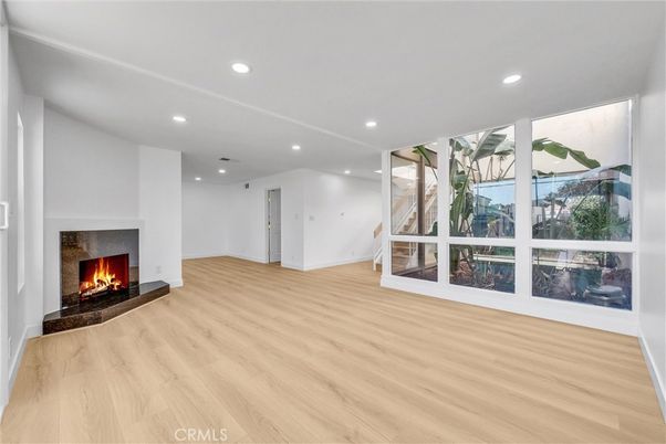 Empty room, Fireplace, Interior, Recessed Lighting, Wood Texture Flooring