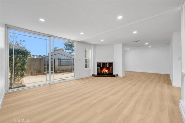 Empty room, Fireplace, Interior, Recessed Lighting, Wood Texture Flooring