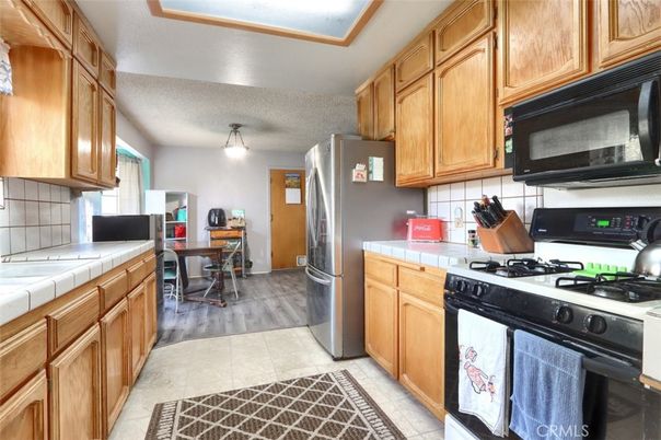 Dining room, Interior, Kitchen, Tile Countertops, Wood Texture Flooring