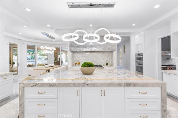 Interior, Kitchen, Marble, Marble Walls, Pendant Lights, Recessed Lighting, Stainless Steel Appliances