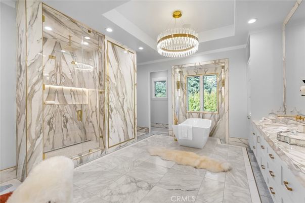 Bathroom, Chandelier, Free Standing Baths, Glass Shower, Interior, Marble, Marble Walls, Recessed Lighting