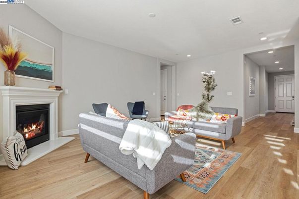 Fireplace, Interior, Living room, Recessed Lighting, Wood Texture Flooring