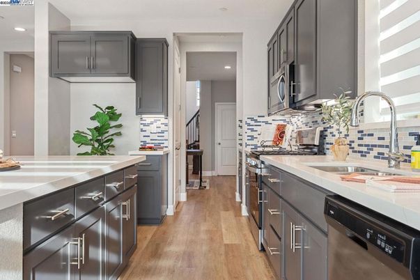 Interior, Kitchen, Recessed Lighting, Stainless Steel Appliances, Wood Texture Flooring