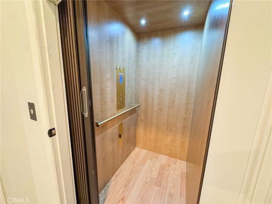 Elevator, Interior, Recessed Lighting, Wooden Ceilings, Wood Texture Flooring, Wooden Walls