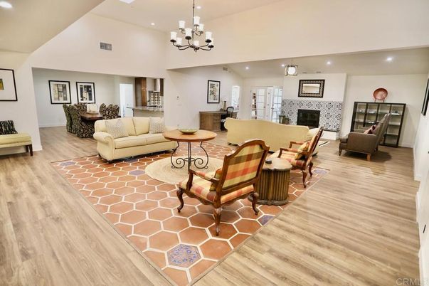 Chandelier, Fireplace, Interior, Living room, Pendant Lights, Recessed Lighting, Wood Texture Flooring