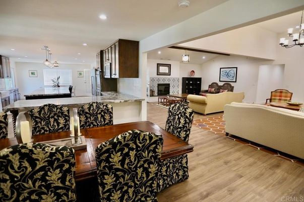 Chandelier, Dining room, Fireplace, Interior, Kitchen, Living room, Pendant Lights, Recessed Lighting, Wood Texture Flooring