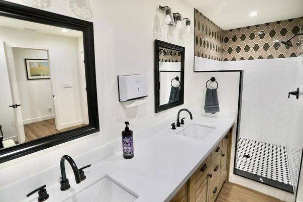 Bathroom, Dual Sink Vanities, Interior, Recessed Lighting, Wood Texture Flooring