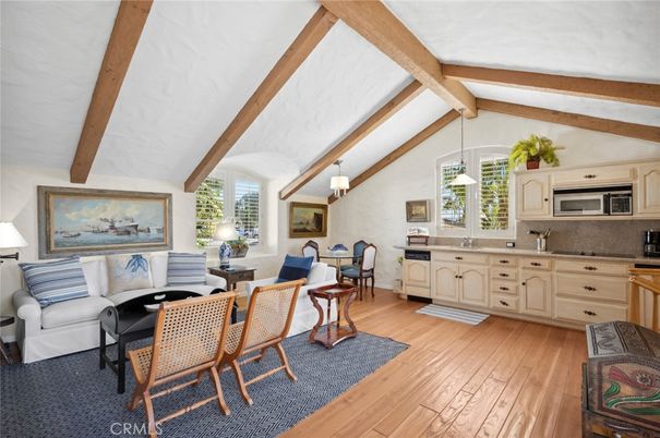 Dining room, Interior, Kitchen, Living room, Pendant Lights, Stainless Steel Appliances, Wooden Beams, Wood Texture Flooring