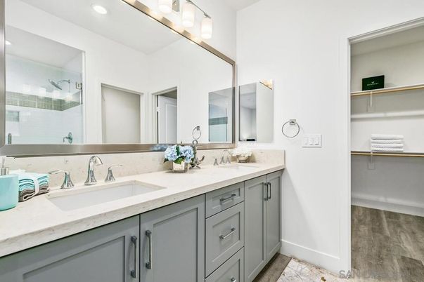 Bathroom, Dual Sink Vanities, Interior, Recessed Lighting, Wood Texture Flooring