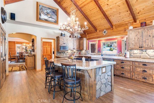 Chandelier, Dining room, Interior, Kitchen, Stainless Steel Appliances, Wooden Beams, Wooden Ceilings, Wood Texture Flooring