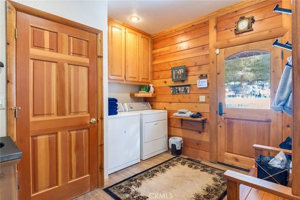 Interior, Recessed Lighting, Washer, Wood Texture Flooring, Wooden Walls