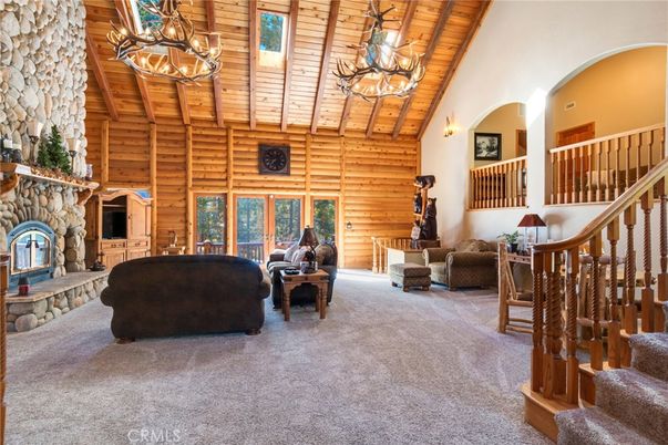 Chandelier, Fireplace, Interior, Living room, Pendant Lights, Wooden Beams, Wooden Ceilings, Wooden Walls