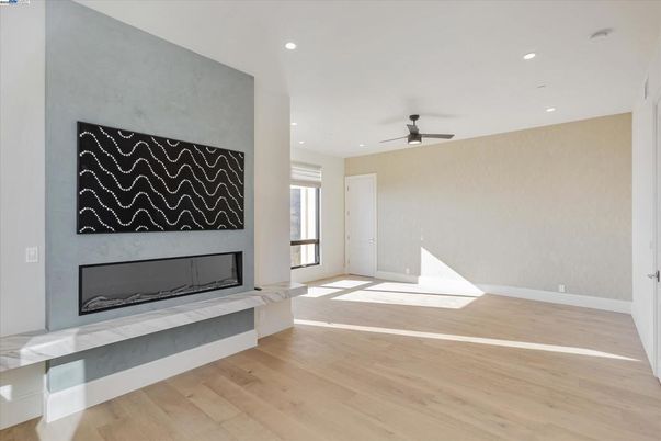 Empty room, Fireplace, Interior, Recessed Lighting, Wood Texture Flooring