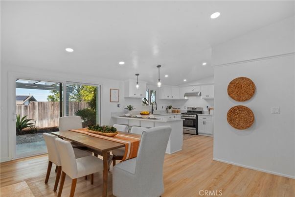 Dining room, Interior, Kitchen, Pendant Lights, Recessed Lighting, Stainless Steel Appliances, Wood Texture Flooring