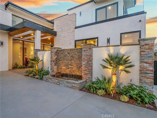 Exterior, Facade, Fireplace, Modern