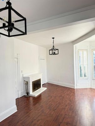 Empty room, Fireplace, Interior, Pendant Lights, Wood Texture Flooring