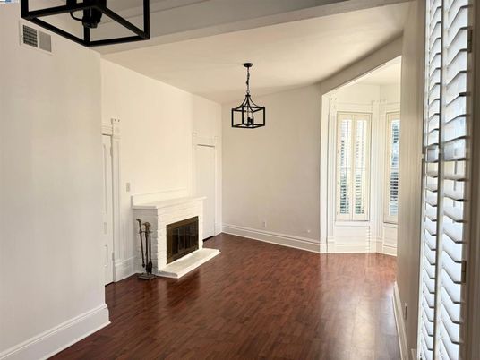 Empty room, Fireplace, Interior, Pendant Lights, Wood Texture Flooring