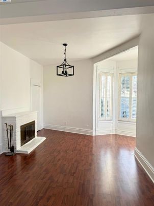 Empty room, Fireplace, Interior, Pendant Lights, Wood Texture Flooring