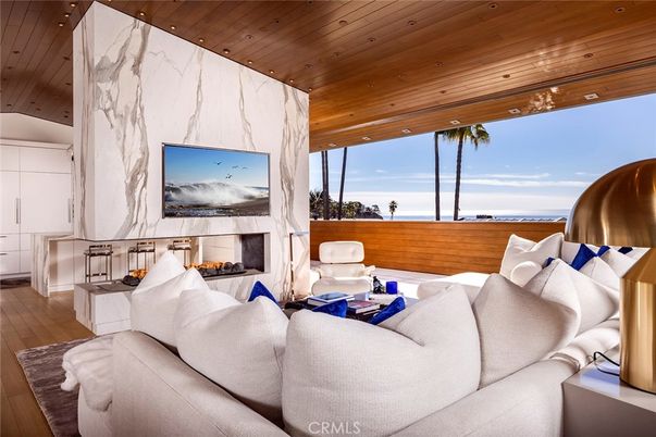 Fireplace, Interior, Living room, Marble Walls, Recessed Lighting, Water, Wooden Ceilings, Wood Texture Flooring