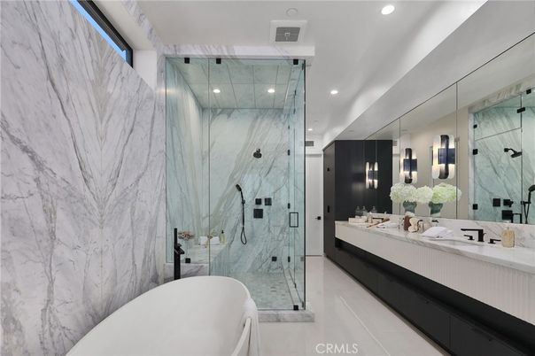 Bathroom, Dual Sink Vanities, Free Standing Baths, Glass Shower, Interior, Marble, Marble Walls, Recessed Lighting