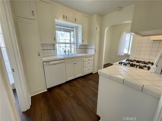 Interior, Kitchen, Tile Countertops, Wood Texture Flooring