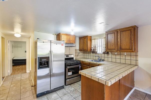 Interior, Kitchen, Stainless Steel Appliances, Tile Countertops