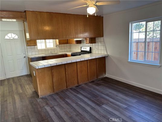 Interior, Kitchen, Tile Countertops, Wood Texture Flooring