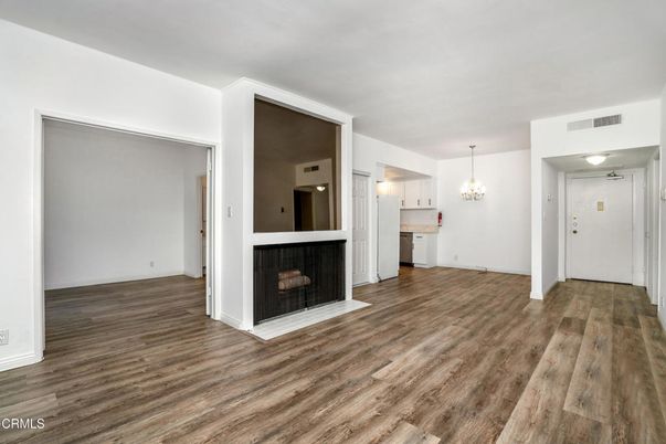Chandelier, Empty room, Fireplace, Interior, Wood Texture Flooring