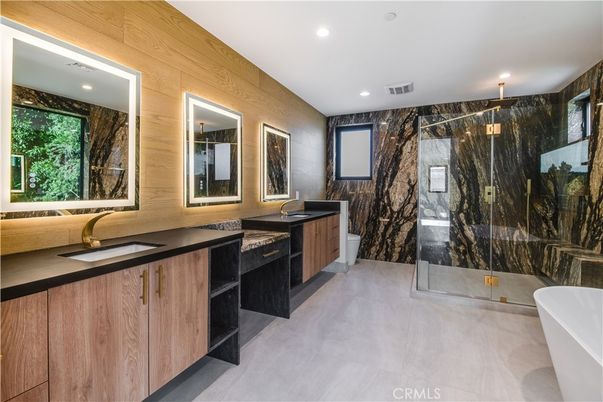Bathroom, Dual Sink Vanities, Free Standing Baths, Interior, Marble Walls, Recessed Lighting, Wooden Walls