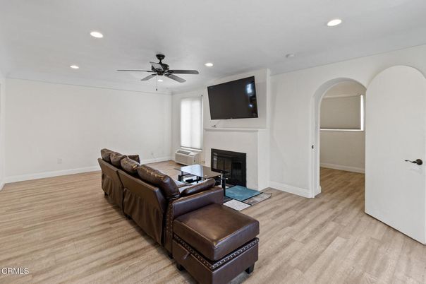 Fireplace, Interior, Living room, Recessed Lighting, Wood Texture Flooring