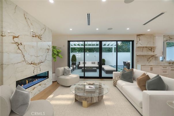 Fireplace, Interior, Living room, Marble Walls, Recessed Lighting, Wood Texture Flooring