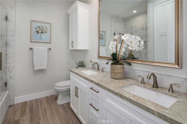Bathroom, Dual Sink Vanities, Interior, Recessed Lighting, Wood Texture Flooring