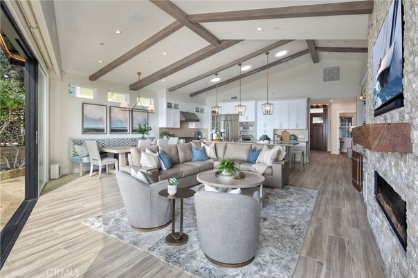 Dining room, Fireplace, Interior, Kitchen, Living room, Pendant Lights, Recessed Lighting, Stainless Steel Appliances, Wooden Beams, Wood Texture Flooring