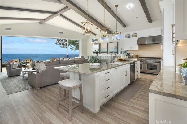 Interior, Kitchen, Living room, Pendant Lights, Recessed Lighting, Stainless Steel Appliances, Water, Wooden Beams, Wood Texture Flooring