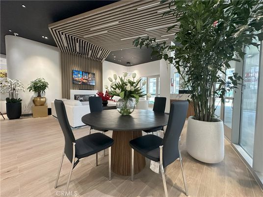 Dining room, Fireplace, Interior, Living room, Recessed Lighting, Wood Texture Flooring
