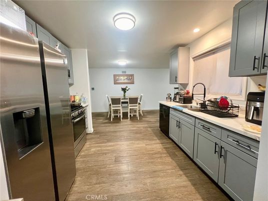 Dining room, Interior, Kitchen, Recessed Lighting, Stainless Steel Appliances, Wood Texture Flooring