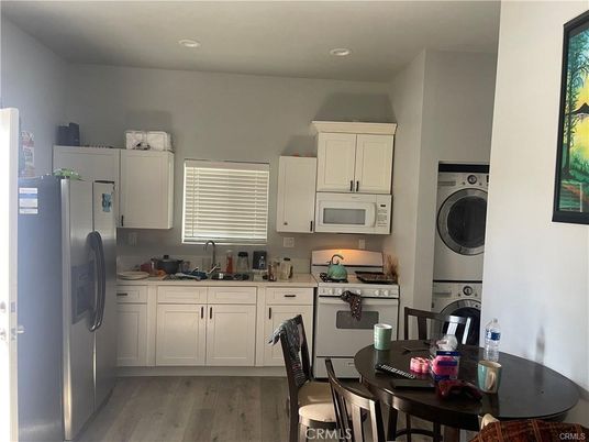 Dining room, Interior, Kitchen, Recessed Lighting, Washer, Wood Texture Flooring