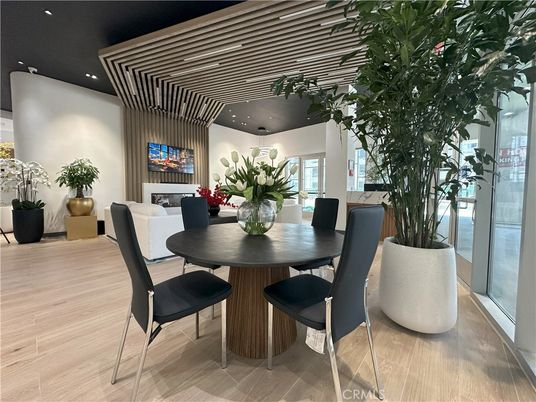 Dining room, Fireplace, Interior, Living room, Recessed Lighting, Wood Texture Flooring