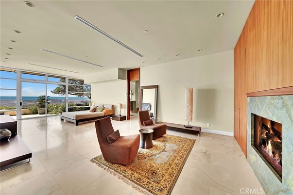 Fireplace, Interior, Living room, Recessed Lighting, Water, Wooden Walls